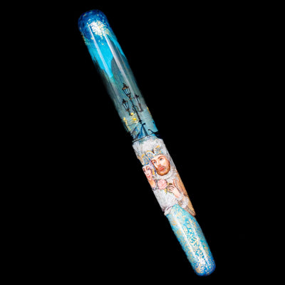 An overhead view of an Artus fountain pen showcasing a Venitian scene, capped.
