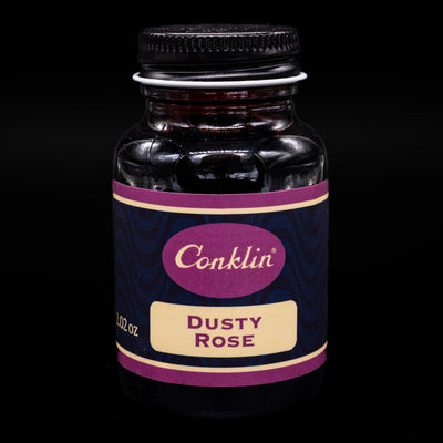 An overhead view of a conklin ink bottle.