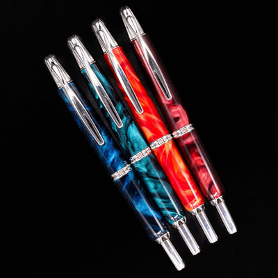 An overhead view of 4 Pilot Vanishing Points in different marble colors.