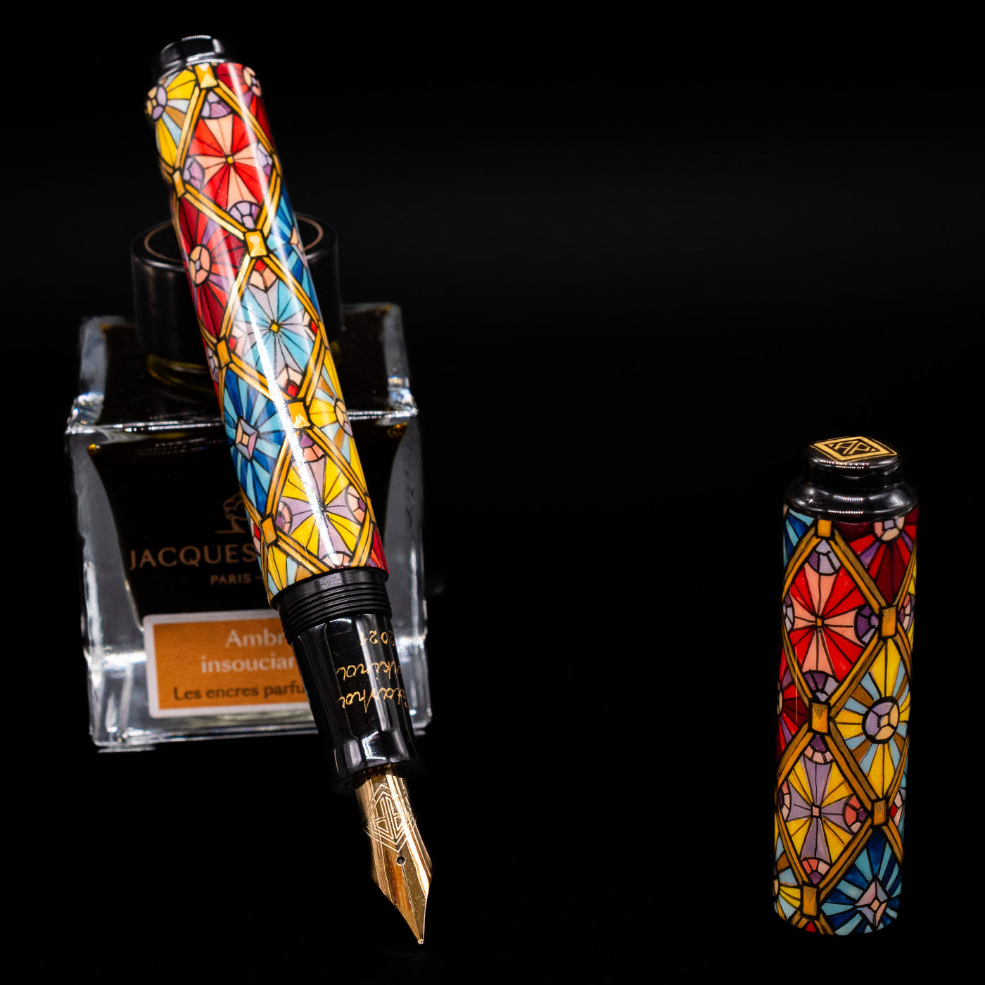 AP Limited Editions Imperial Lacquer Art Fountain Pen - Tiffany leaning on an ink bottle uncapped showcasing the detailing on the nib.