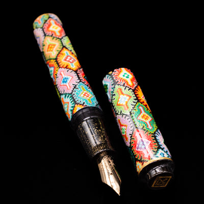 A full view of the AP Limited Editions Imperial Lacquer Art Fountain Pen - Tutankhamen uncapped, with its cap laying next to the pen. 