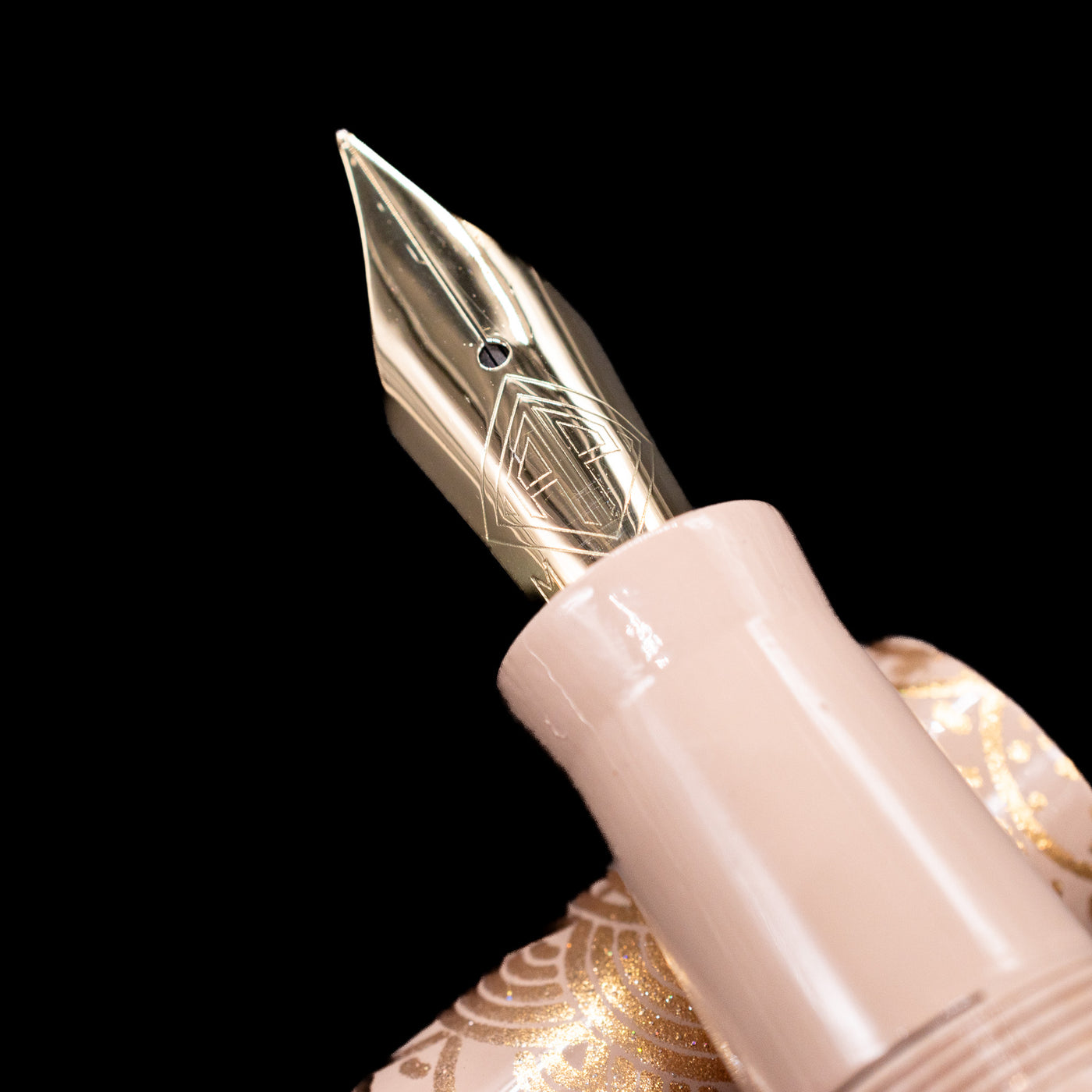  A macro shot of the nib with its intricate detailing and logo engraving for the AP Limited Editions Sakura Lacquer Art Fountain Pen - Rabbits in a Summer Garden.