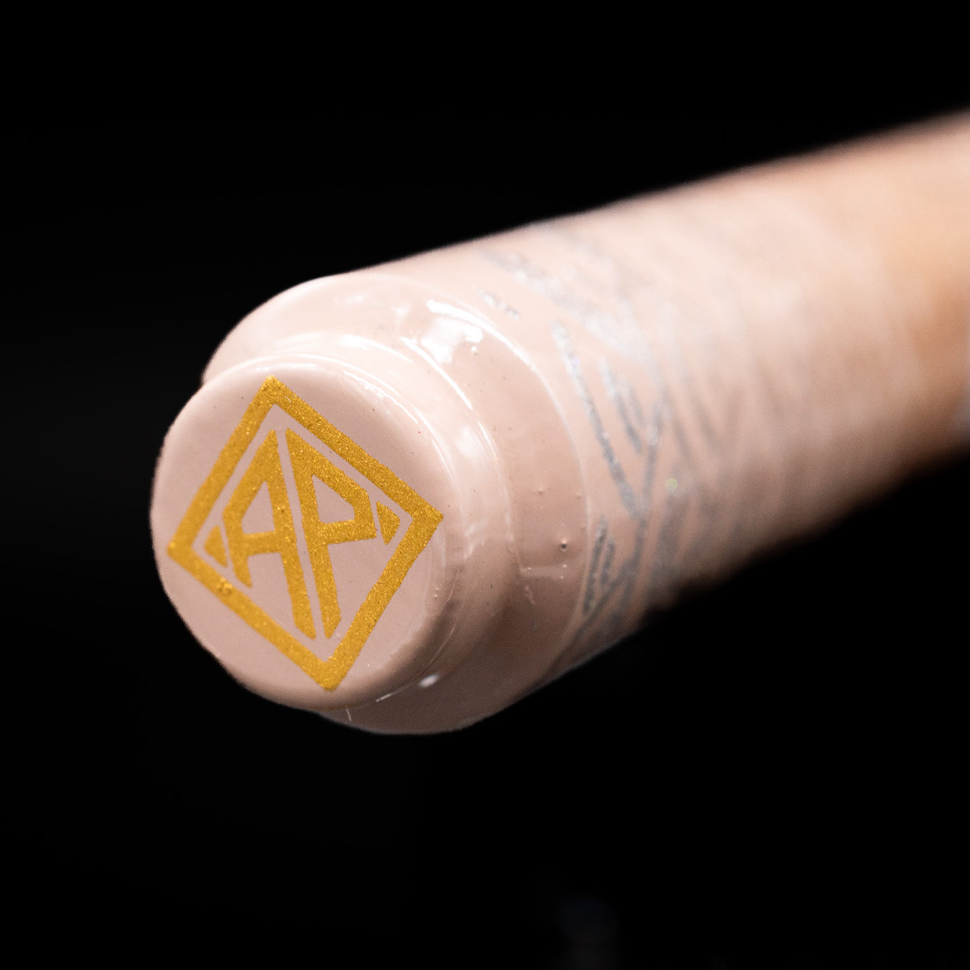 Zoomed-in view of the top of the cap with the finial on the AP Limited Editions Sakura Lacquer Art Fountain Pen - Rabbits in a Summer Garden.