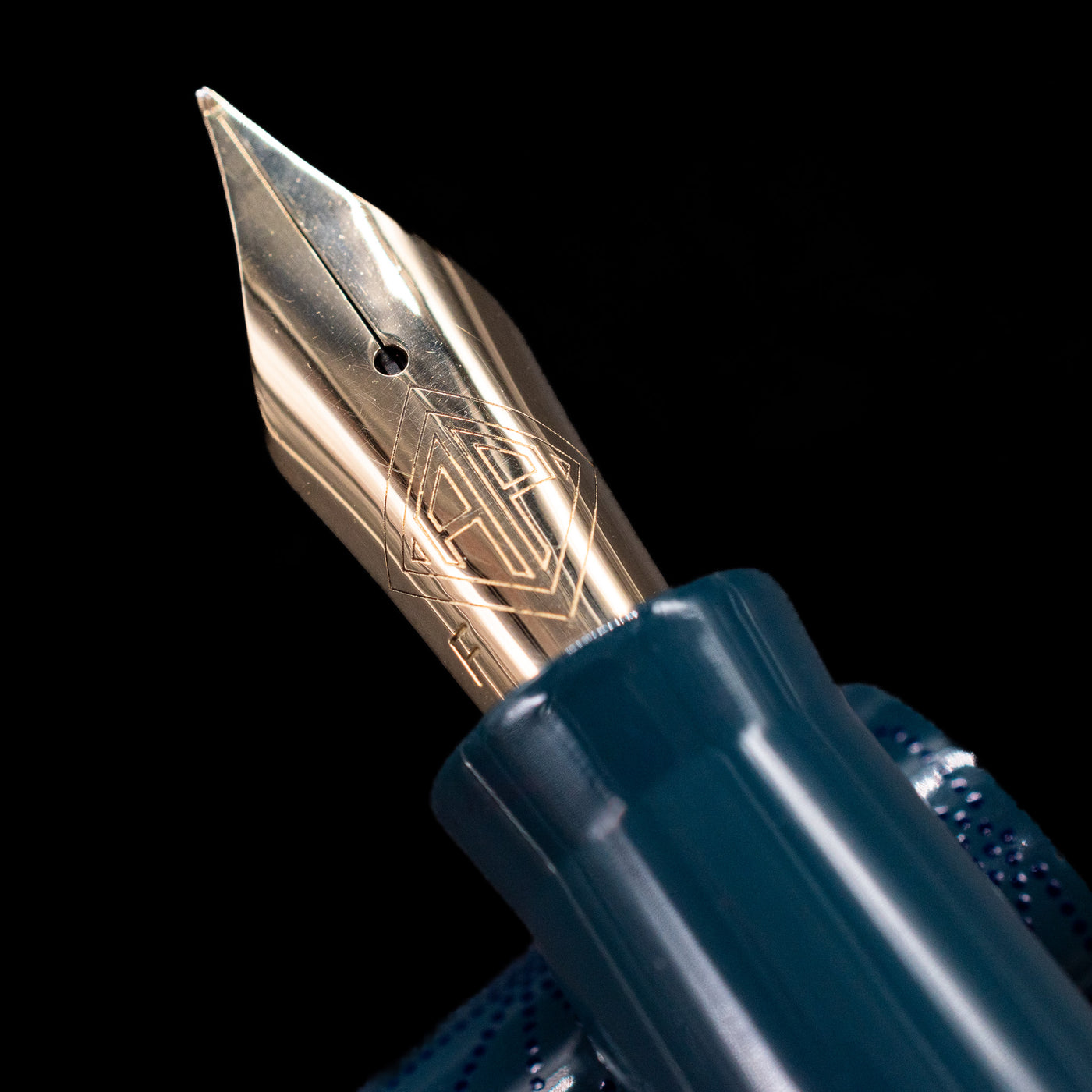  A macro shot of the nib with its intricate detailing and logo engraving for the AP Limited Editions Sakura Lacquer Art Fountain Pen - Snowflakes Blue.