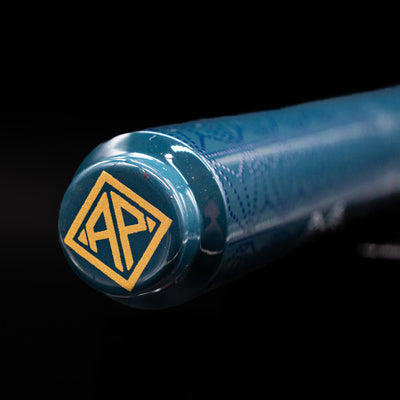 Zoomed-in view of the top of the cap with the finial on the AP Limited Editions Sakura Lacquer Art Fountain Pen - Snowflakes Blue.