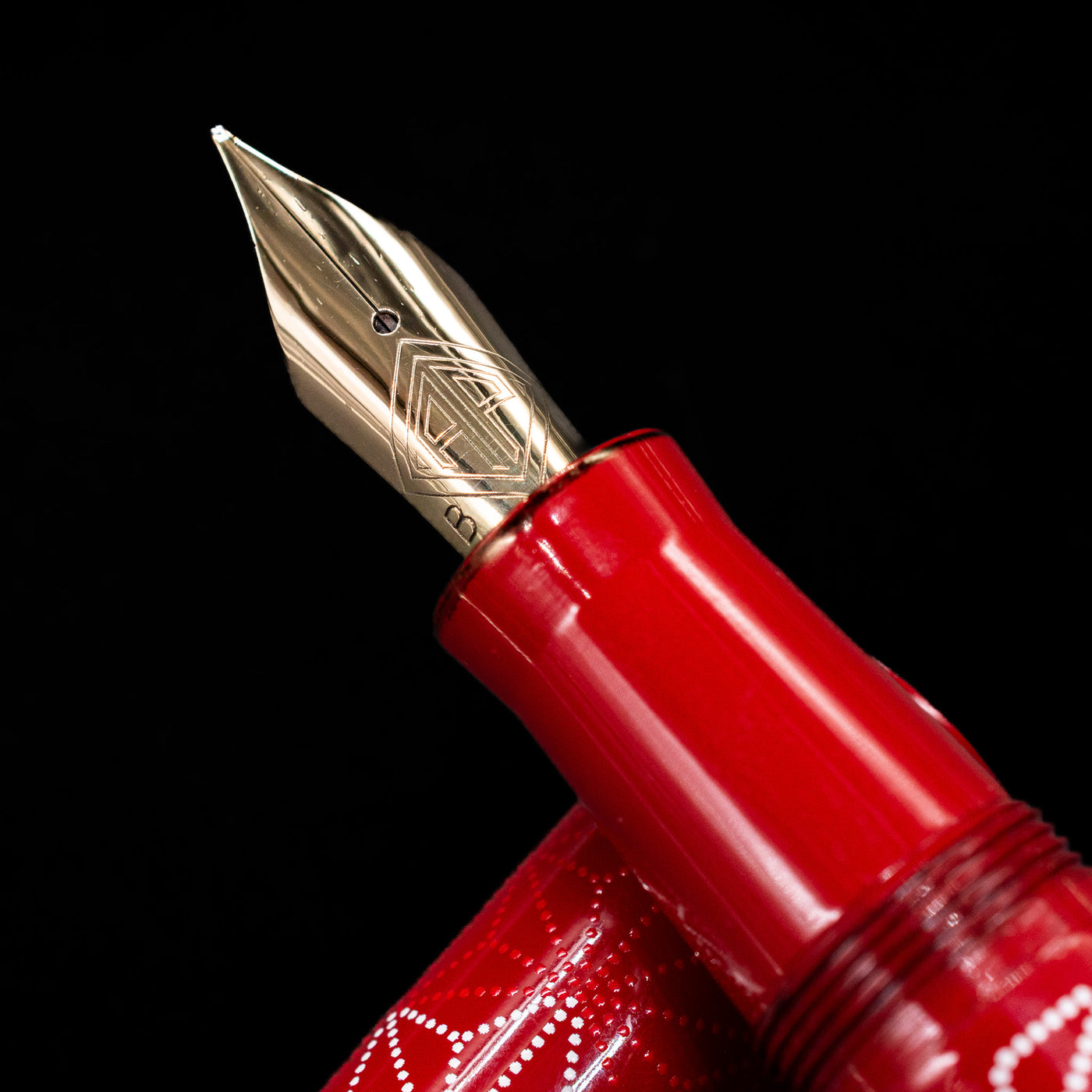  A macro shot of the nib with its intricate detailing and logo engraving for the AP Limited Editions Sakura Lacquer Art Fountain Pen - Snowflakes Red.