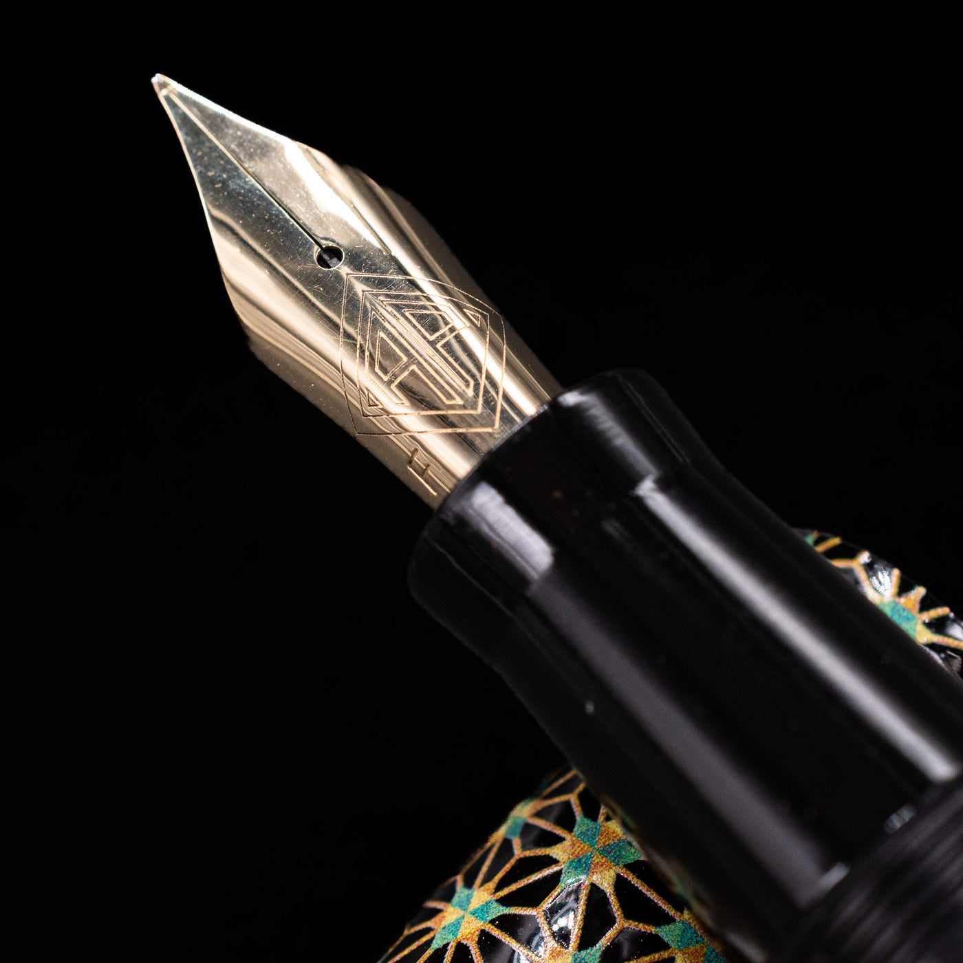 A macro shot of the nib with its intricate detailing and logo engraving for the AP Limited Editions Sakura Lacquer Art Fountain Pen - Teal Stars.