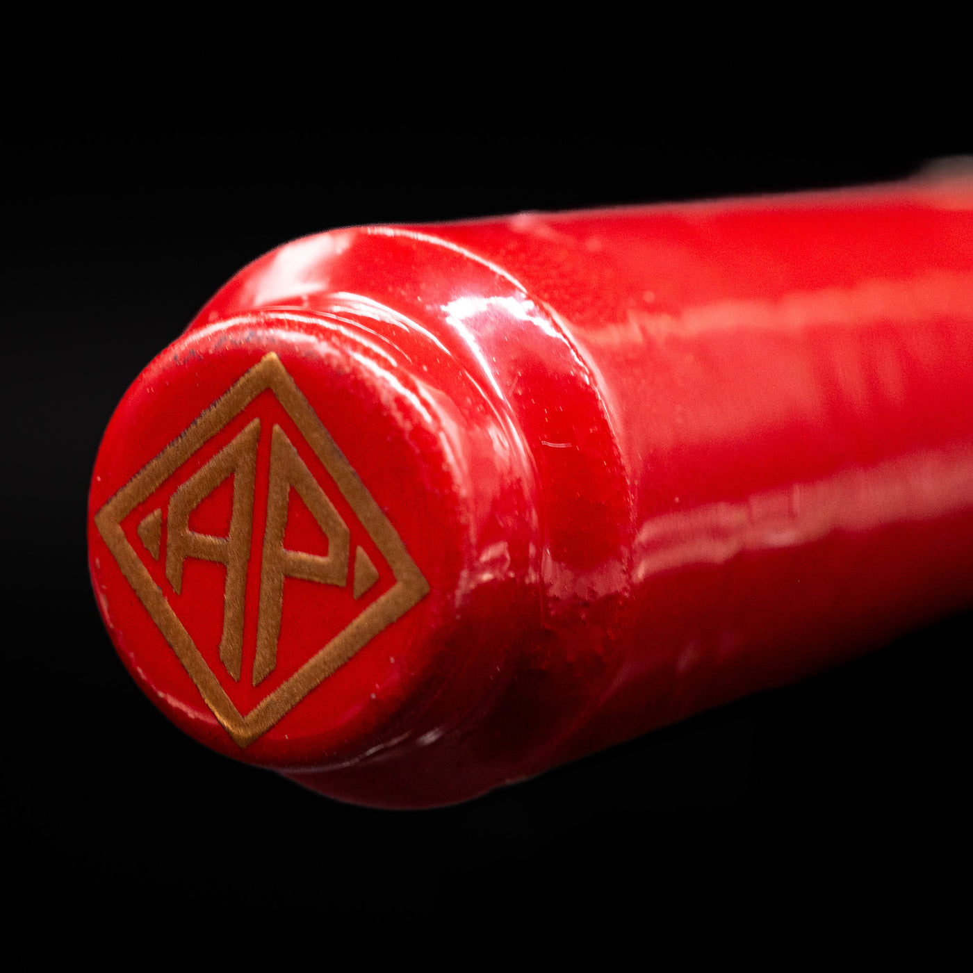 Zoomed-in view of the top of the cap with the finial on the AP Limited Editions Sakura Lacquer Art Fountain Pen - Year of the Rabbit.