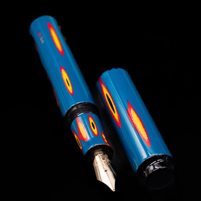  A full view of the AP Limited Editions Urushi Lacquer Art Fountain Pen - Amorphous Splendour uncapped, with its cap laying next to the pen. 