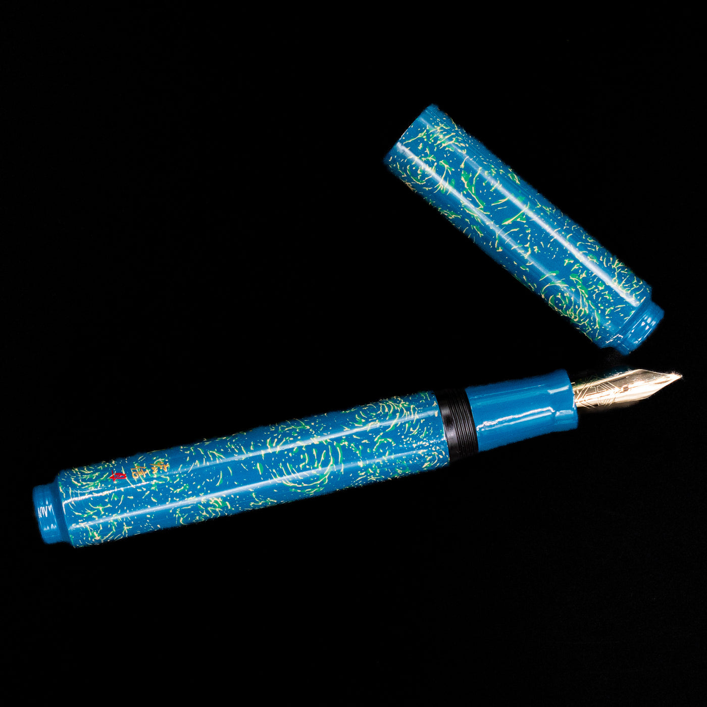 An overhead view of the AP Limited Editions Urushi Lacquer Art Fountain Pen - Blue Bliss uncapped.
