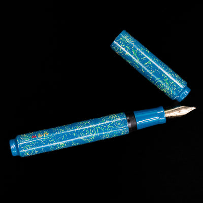 An overhead view of the AP Limited Editions Urushi Lacquer Art Fountain Pen - Blue Bliss uncapped.