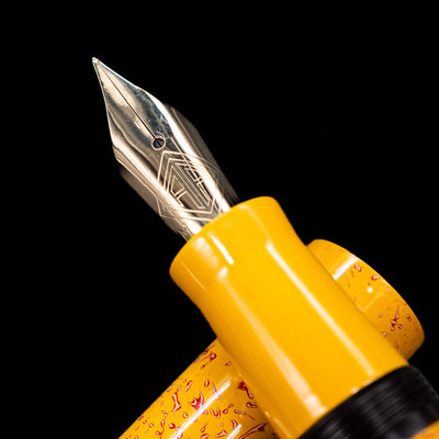 A macro shot of the nib with its intricate detailing and logo engraving for the AP Limited Editions Urushi Lacquer Art Fountain Pen - Sunshine.