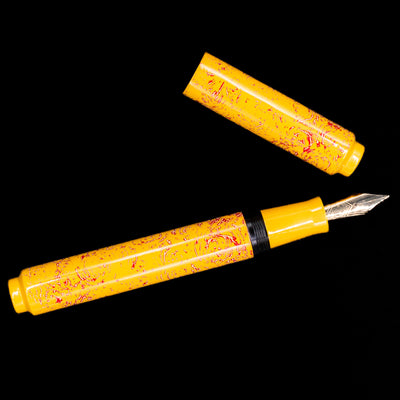 An overhead view of the AP Limited Editions Urushi Lacquer Art Fountain Pen - Sunshine uncapped.