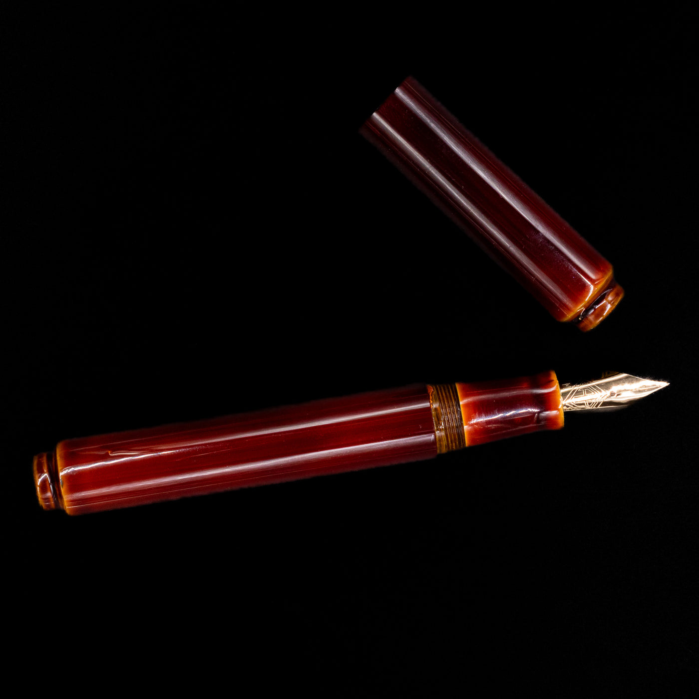 An overhead view of the AP Limited Editions Urushi Lacquer Art Fountain Pen - Tamenuri Yellow uncapped.