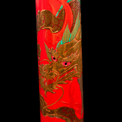 A macro shot of the face of the dragon on the body of the AP Limited Editions Writer Maki-e Fountain Pen - The Celebrated Dragon.