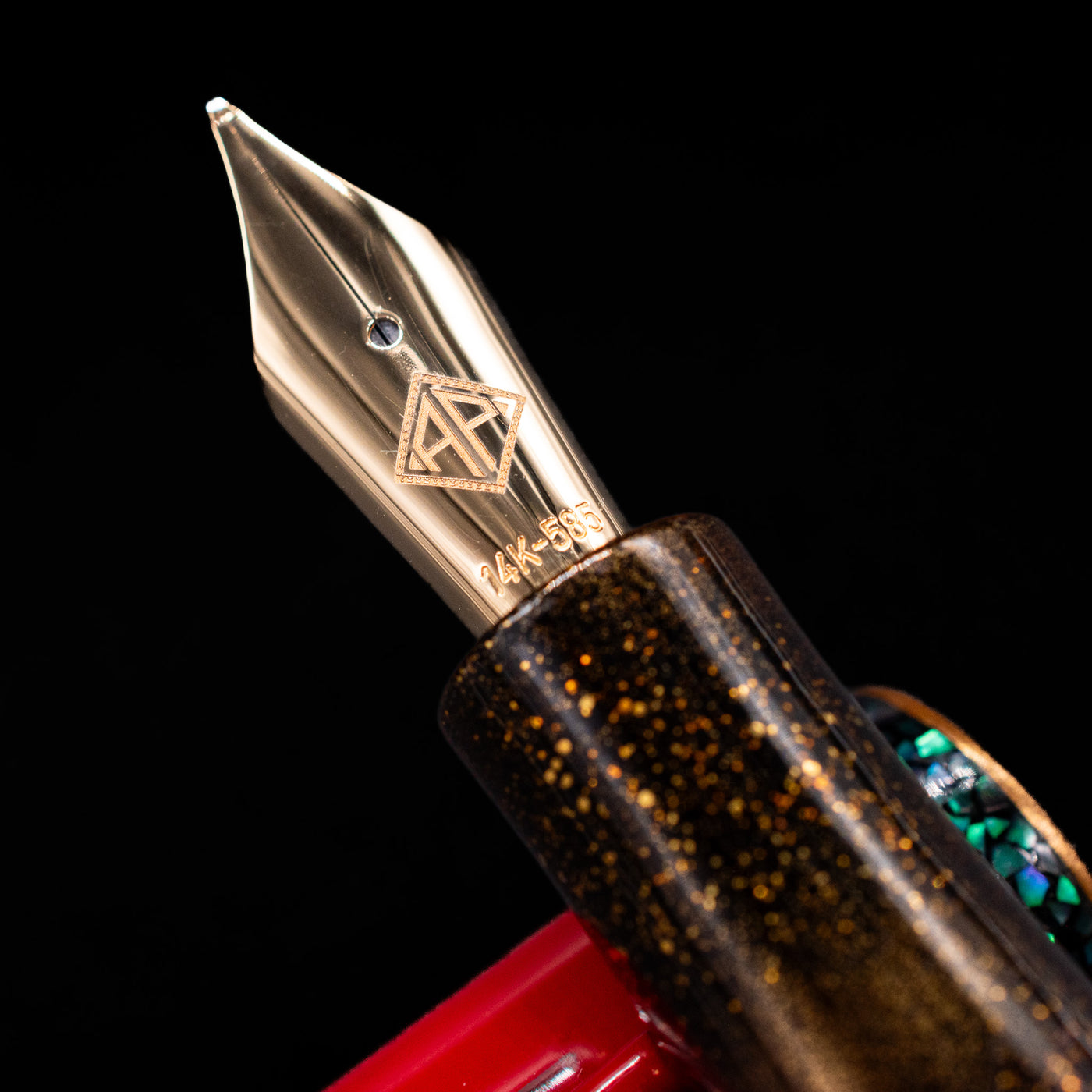 A macro shot of the nib with its intricate detailing and logo engraving for the AP Limited Editions Writer Maki-e Fountain Pen - The Celebrated Dragon.