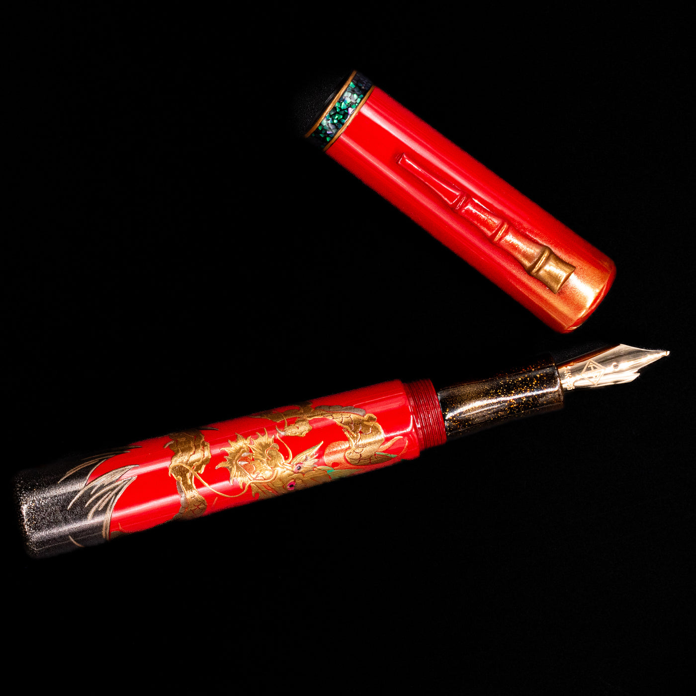 An overhead view of the AP Limited Editions Writer Maki-e Fountain Pen - The Celebrated Dragon uncapped.