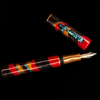 An overhead view of the AP Limited Editions Writer Maki-e Fountain Pen - The Dunes uncapped.