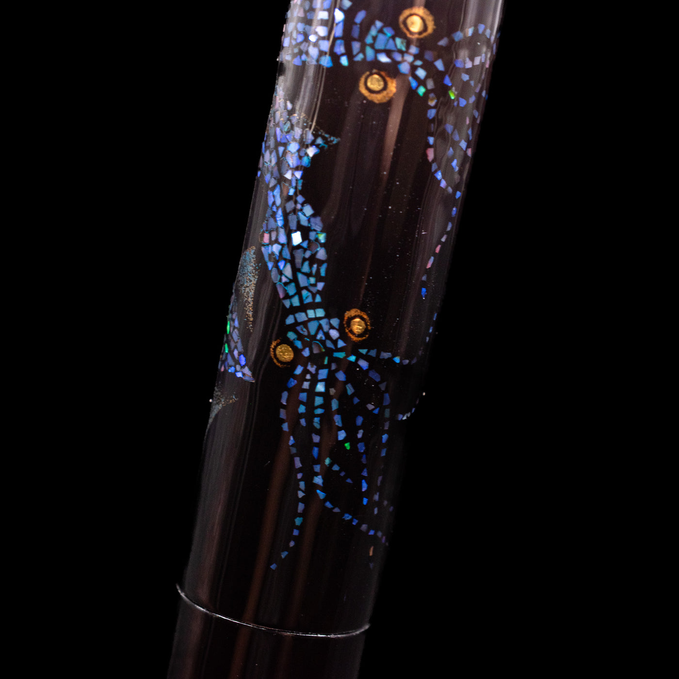 A macro shot of a raden squid on the cap of the AP Limited Editions Writer Maki-e Fountain Pen - The Firefly Squid.