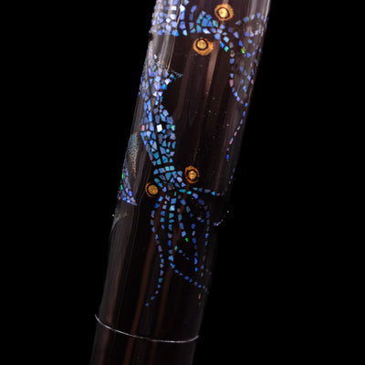 A macro shot of a raden squid on the cap of the AP Limited Editions Writer Maki-e Fountain Pen - The Firefly Squid.