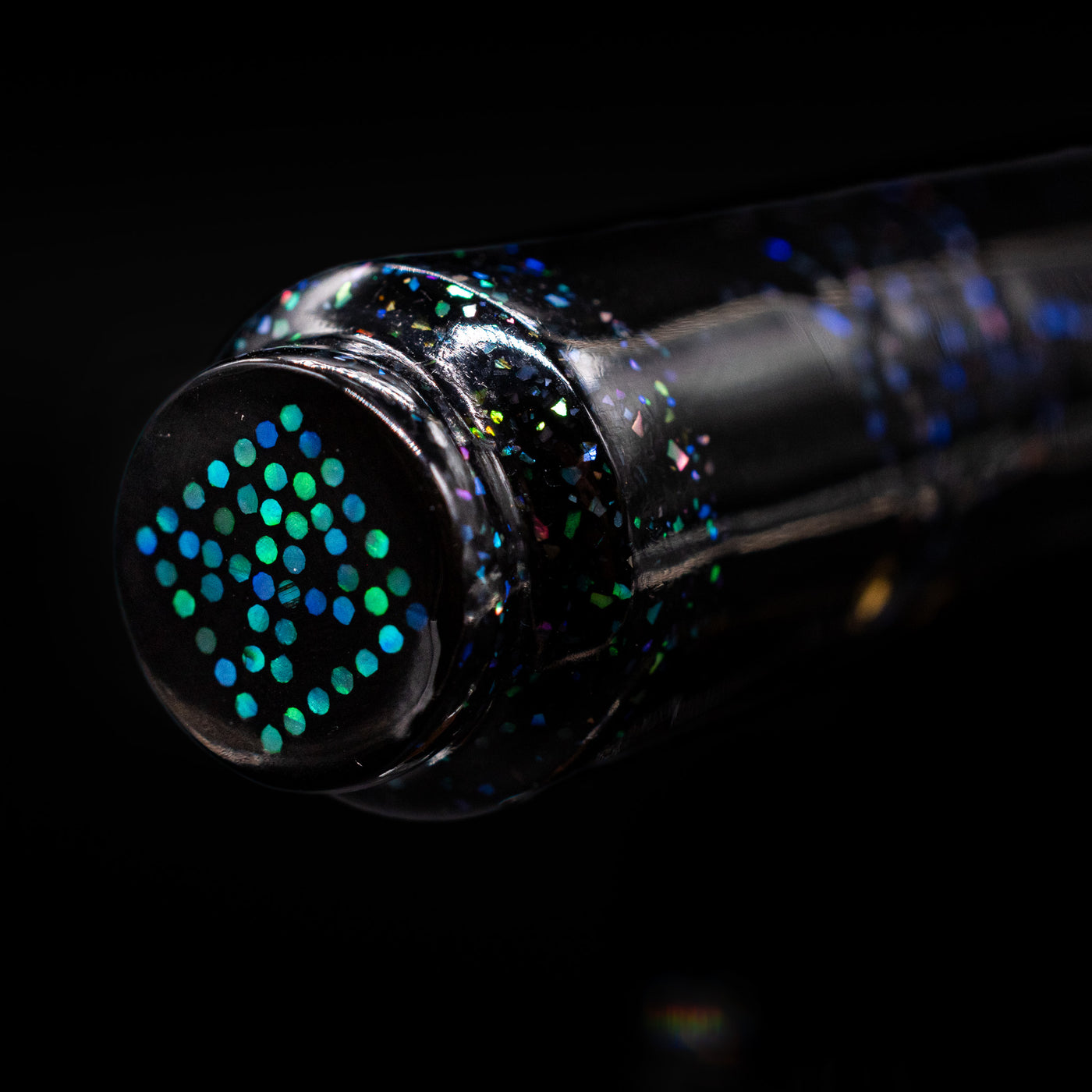 Zoomed-in view of the top of the cap with the finial on the AP Limited Editions Writer Maki-e Fountain Pen - The Firefly Squid.