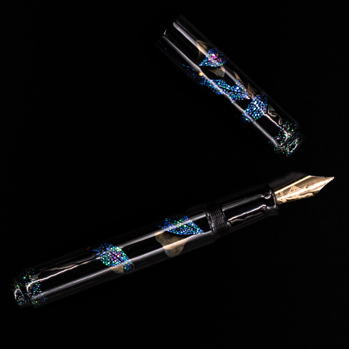 An overhead view of the AP Limited Editions Writer Maki-e Fountain Pen - The Firefly Squid uncapped.