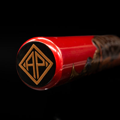 Zoomed-in view of the top of the cap with the finial on the AP Limited Editions Writer Maki-e Fountain Pen - The Pride of Samurai.