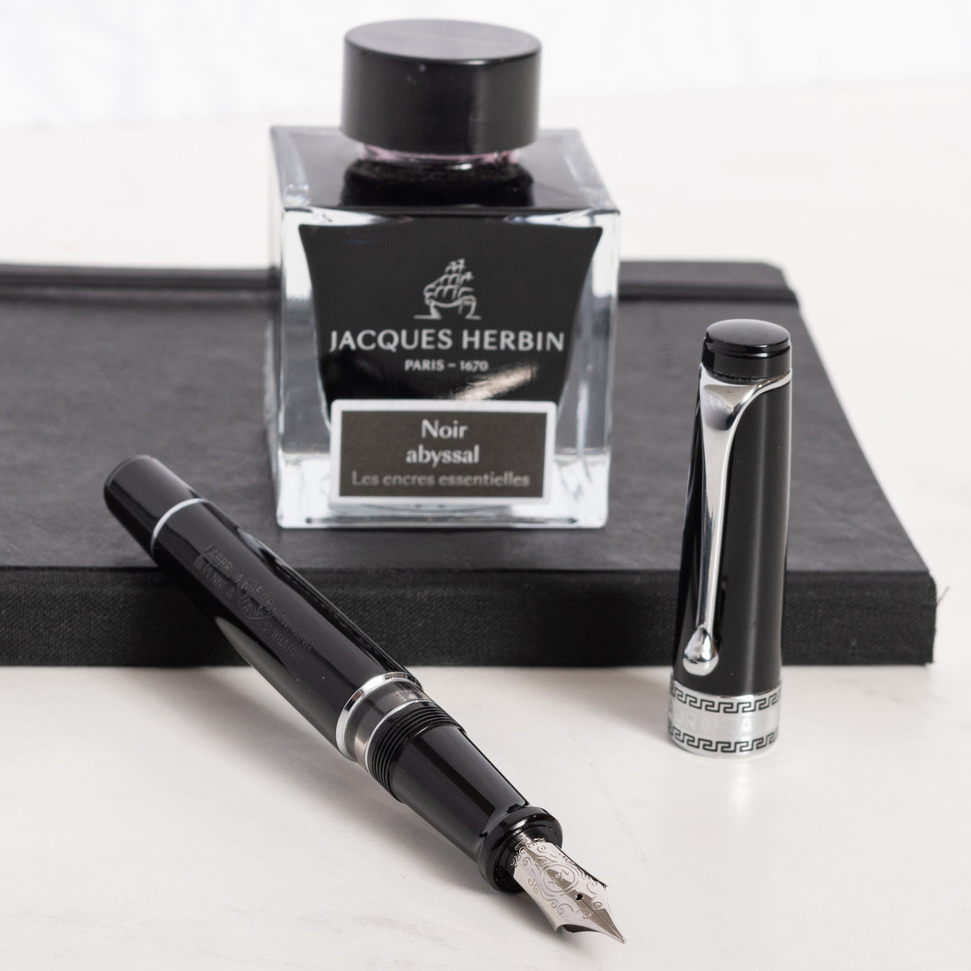 Aurora Optima Black Resin & Chrome Fountain Pen piston filled