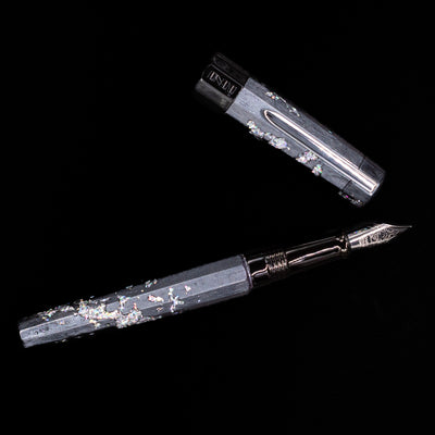 An overhead view of the BENU Euphoria Caviar Fountain Pen uncapped.