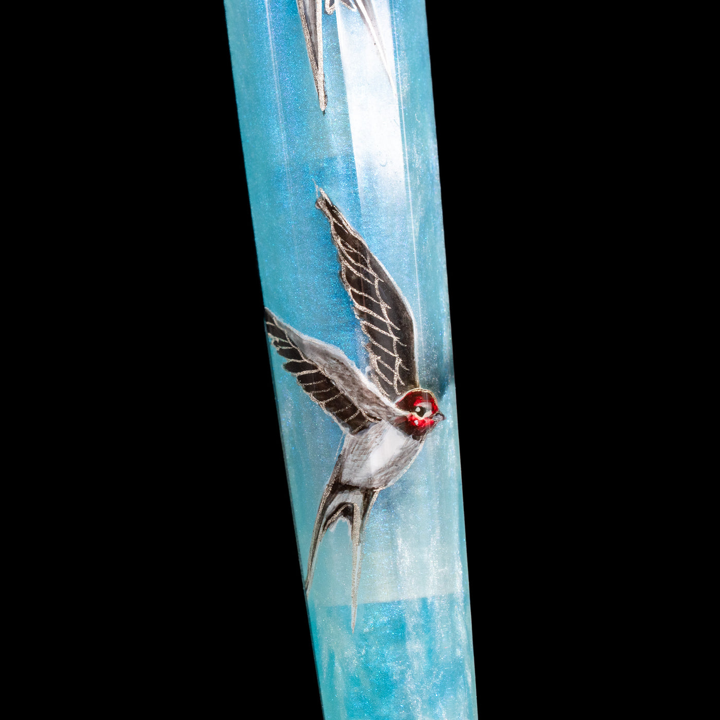 A macro shot of one of the swallows on the BENU Euphoria Limited Edition Fountain Pen - Swallow’s Song.