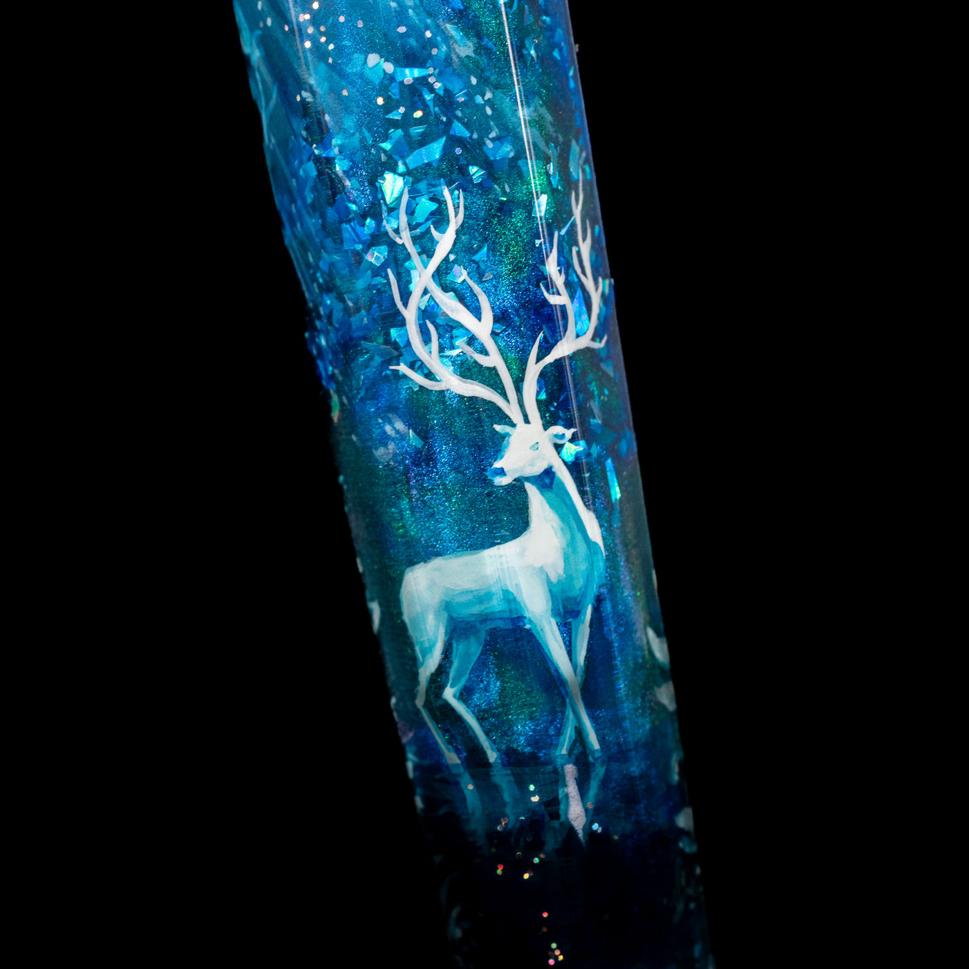 Zoomed in shot of the white stag on the BENU Euphoria White Stag Fountain Pen.