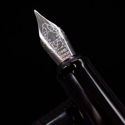 A macro shot of the nib with its intricate detailing and logo engraving for the BENU Happy Chameleon Fountain Pen.