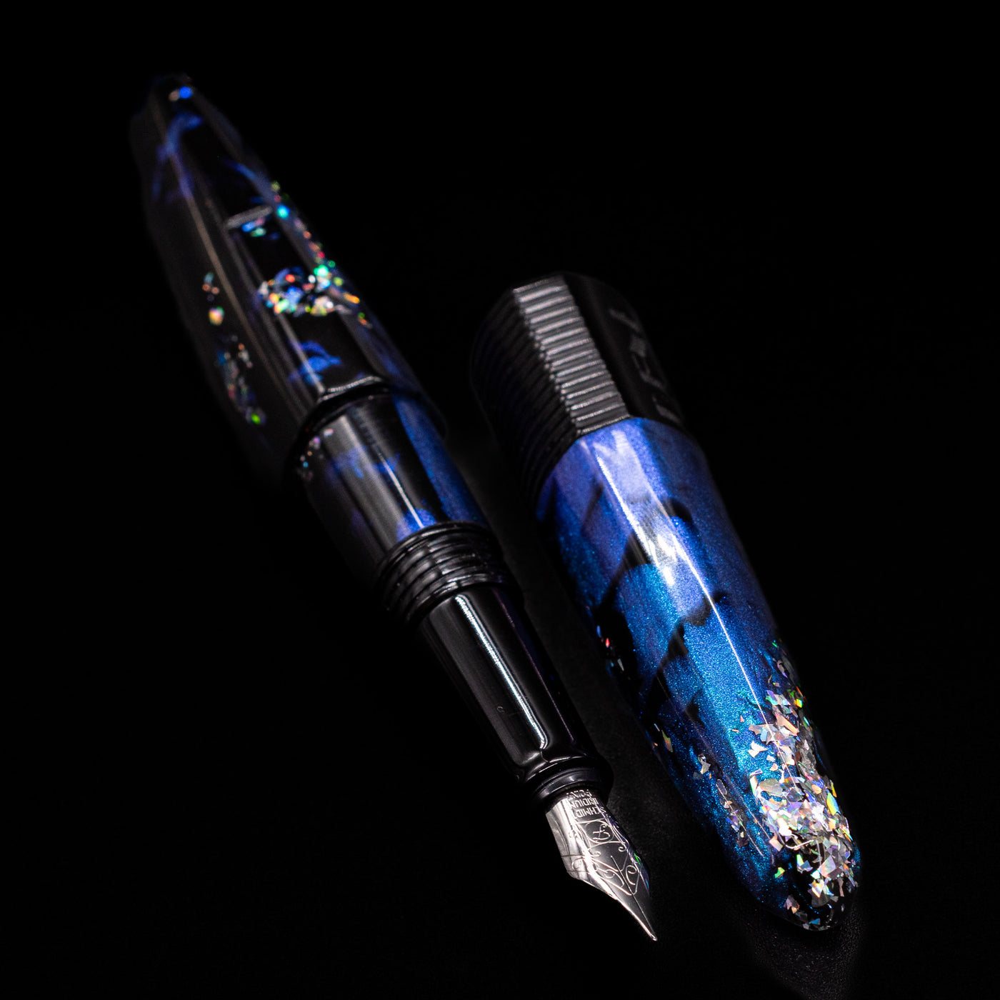 A full view of the BENU Happy Chameleon Fountain Pen uncapped, with its cap laying next to the pen. 