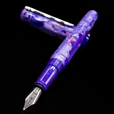 BENU Talisman Limited Edition Fountain Pen - Lavender laying across its own cap, crossed, with a focus on the nib.