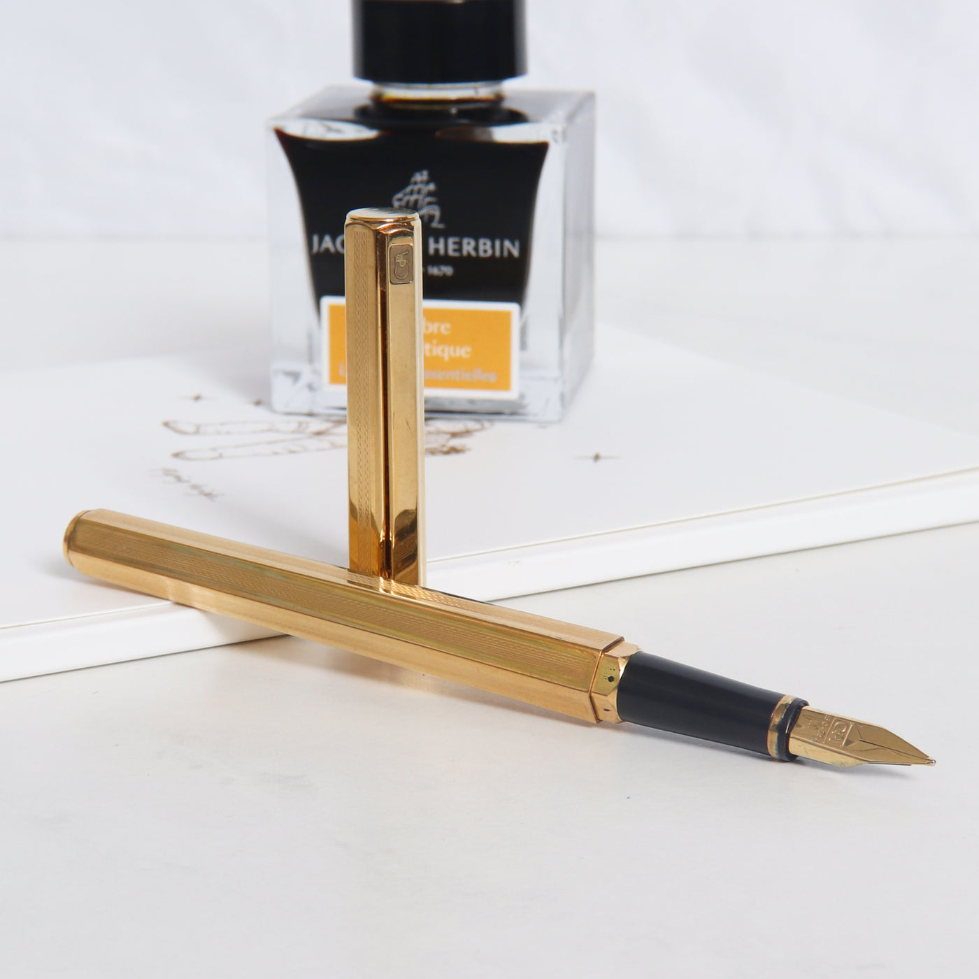 Caran d'Ache Hexagonal Gold Plated Guilloche Fountain Pen - Preowned Uncapped