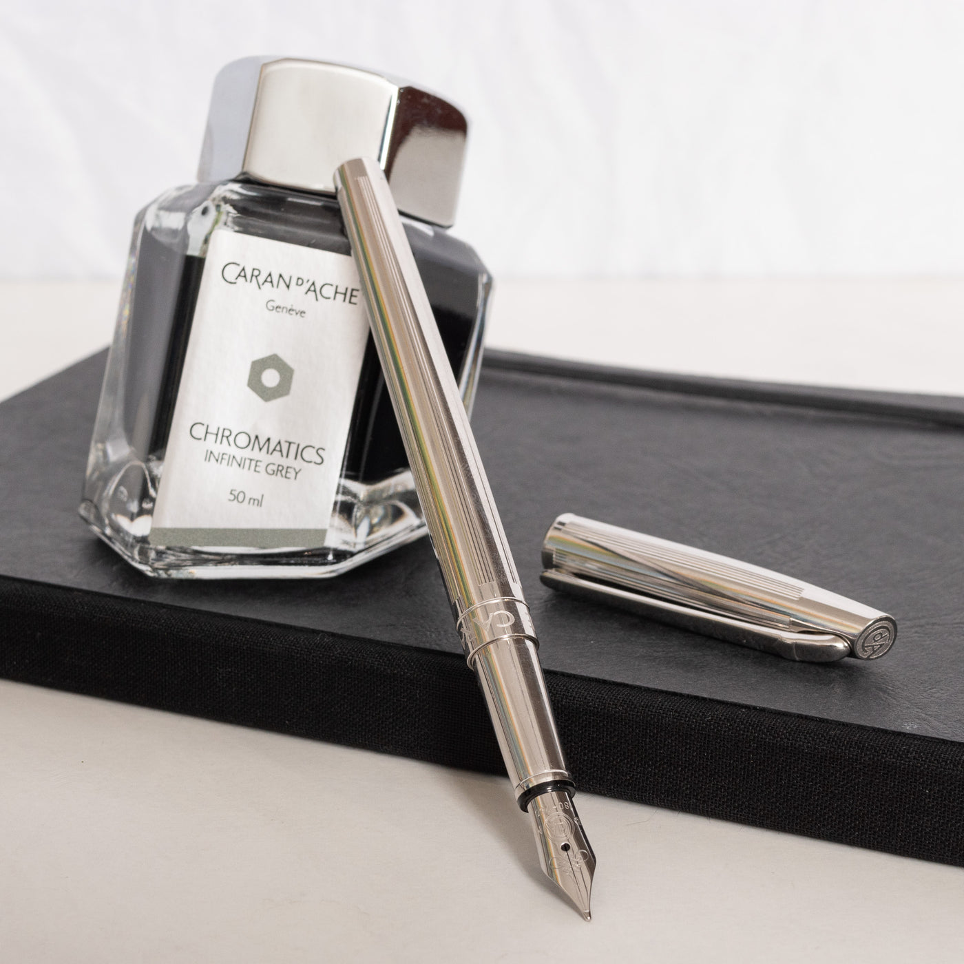 Caran d'Ache Madison Cisele Silver Rhodium Coated Fountain Pen - Preowned Uncapped