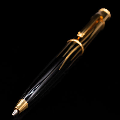 Full view of the Cartier Diabolo Mini Flame Ballpoint Pen - Preowned with a focus on the tip.