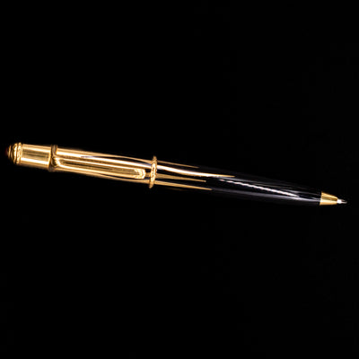 An overhead view of the Cartier Diabolo Mini Flame Ballpoint Pen - Preowned.