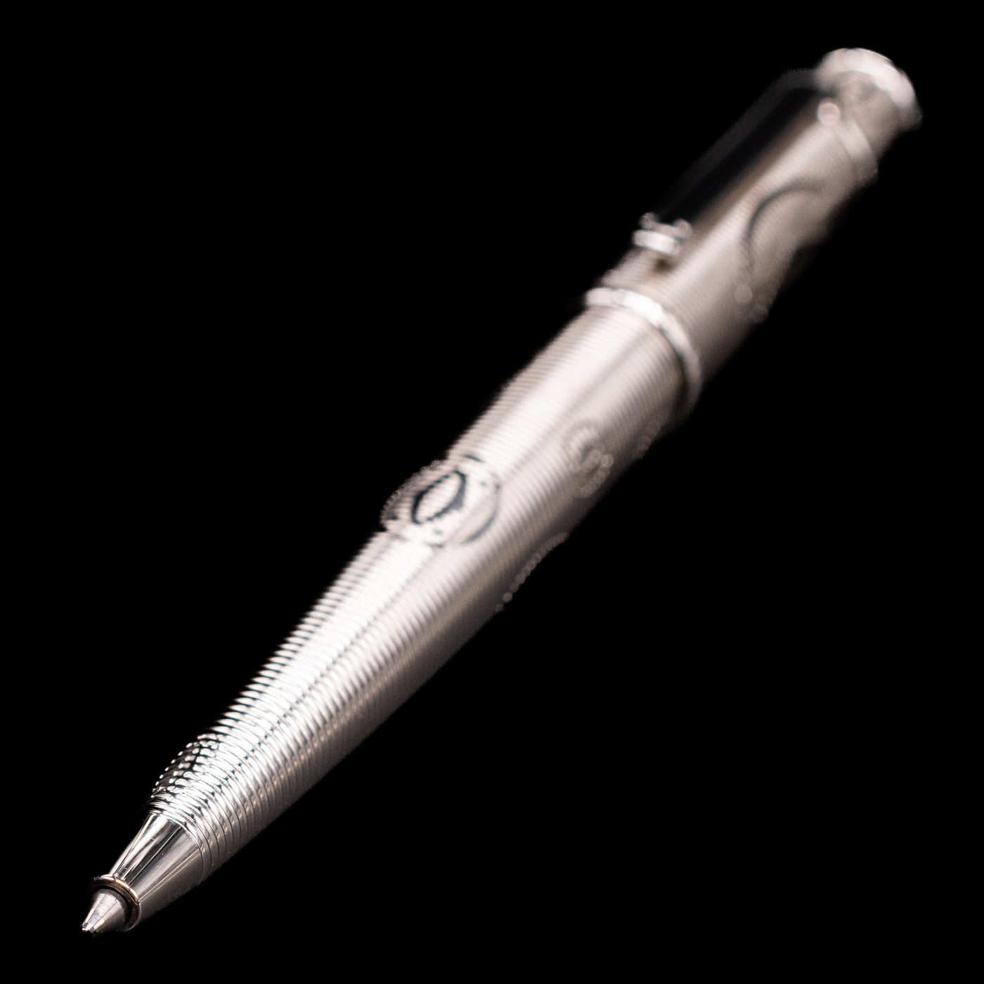 Full view of the Cartier Diabolo Platinum Double C Logo Ballpoint Pen - Preowned with a focus on the tip.