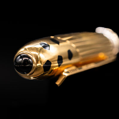 Zoomed-in view of the top of the cap with the finial on the Cartier Panthere Black Lacquer Ballpoint Pen - Preowned.