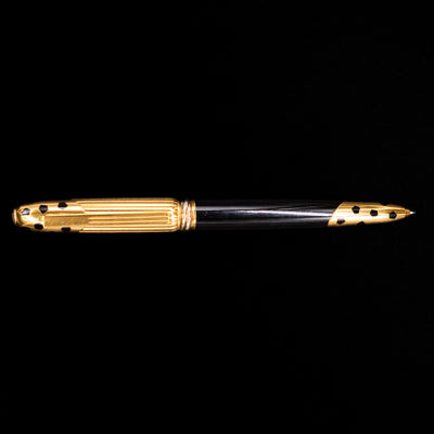 An overhead view of the Cartier Panthere Black Lacquer Ballpoint Pen - Preowned.