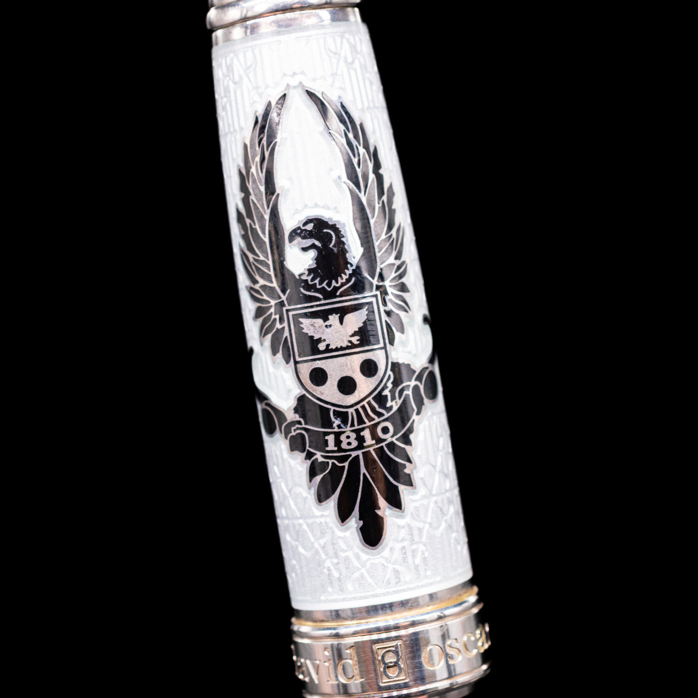 Detail shot of the emblem on the back of the cap on the David Oscarson Black Star & Frost Fountain Pen.