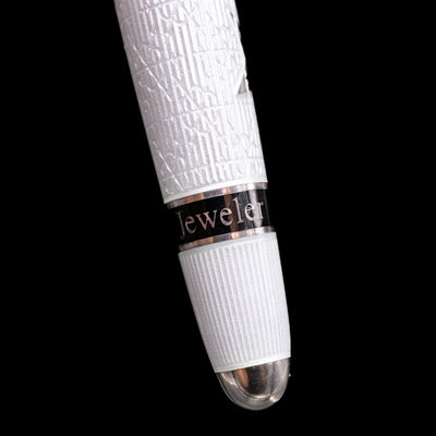 Detail shot of the bottom of the body of the pen showcasing the word "jeweler" on the David Oscarson Black Star & Frost Fountain Pen.