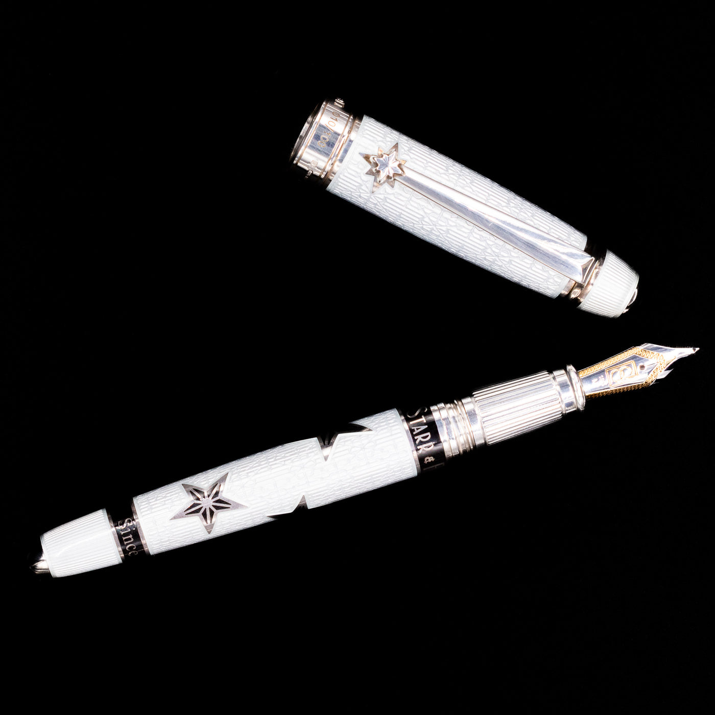  An overhead view of the David Oscarson Black Star & Frost Fountain Pen uncapped. 