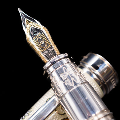 A macro shot of the nib with its intricate detailing and logo engraving for the David Oscarson Carl Linnaeus Fountain Pen - White.