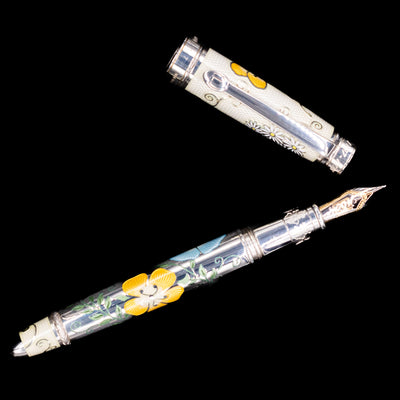 An overhead view of the David Oscarson Carl Linnaeus Fountain Pen - White uncapped.