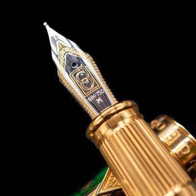 A macro shot of the nib with its intricate detailing and logo engraving for the David Oscarson Harlequin Fountain Pen - Emerald Green.