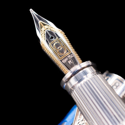  A macro shot of the nib with its intricate detailing and logo engraving for the David Oscarson Harlequin Fountain Pen - Sapphire Blue.