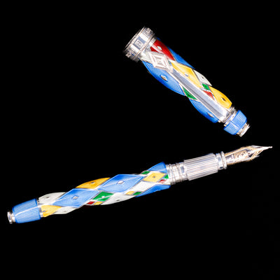 An overhead view of the David Oscarson Harlequin Fountain Pen - Sapphire Blue uncapped.