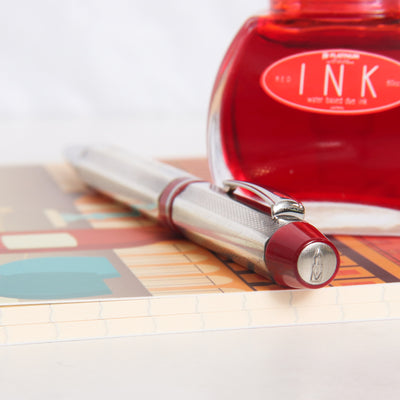 Delta Profili Red & Sterling Silver Ballpoint Pen - Preowned Top of Cap